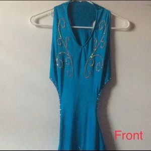 A blue rhinestoned dance costume